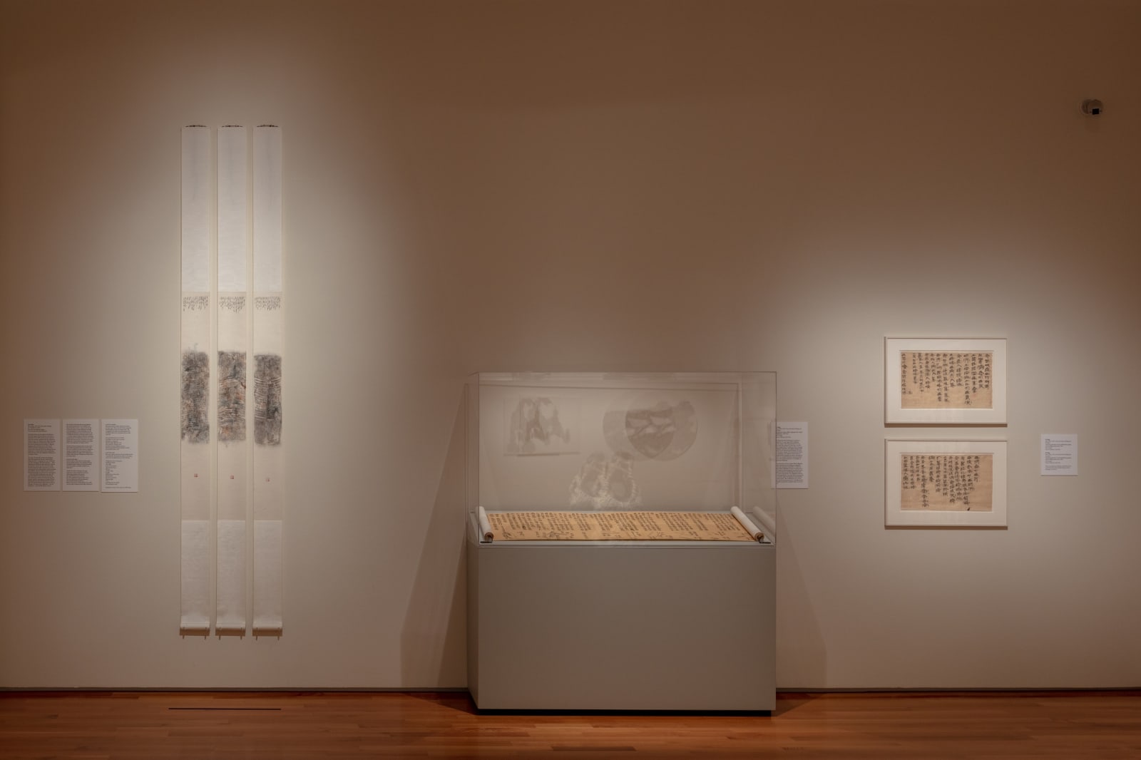 Tao Aimin, In a Twinkle No. 6, 2011, Ink rubbing on paper, set of three hanging scrolls with nushu (women’s script); Xu Bing, Introduction to Square Word Calligraphy (New English Calligraphy), 1994-1996, Calligraphy, ink on paper; Xu Bing, SWC-Sketch for Song of Wandering Aengus Poem by William Butler Yeats, 1999, Calligraphy, ink on paper.
